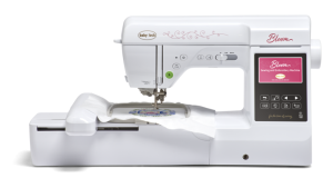 Picture of Baby Lock Bloom sewing machine with display and control buttons. The machine is extended with an embroidery loop inside.